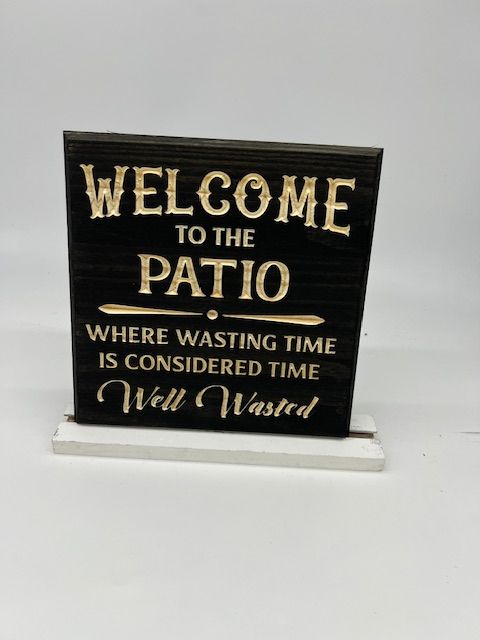 “Welcome to the Patio Where Wasting Time Is Considered Time Well Wasted” – Wooden Patio Sign