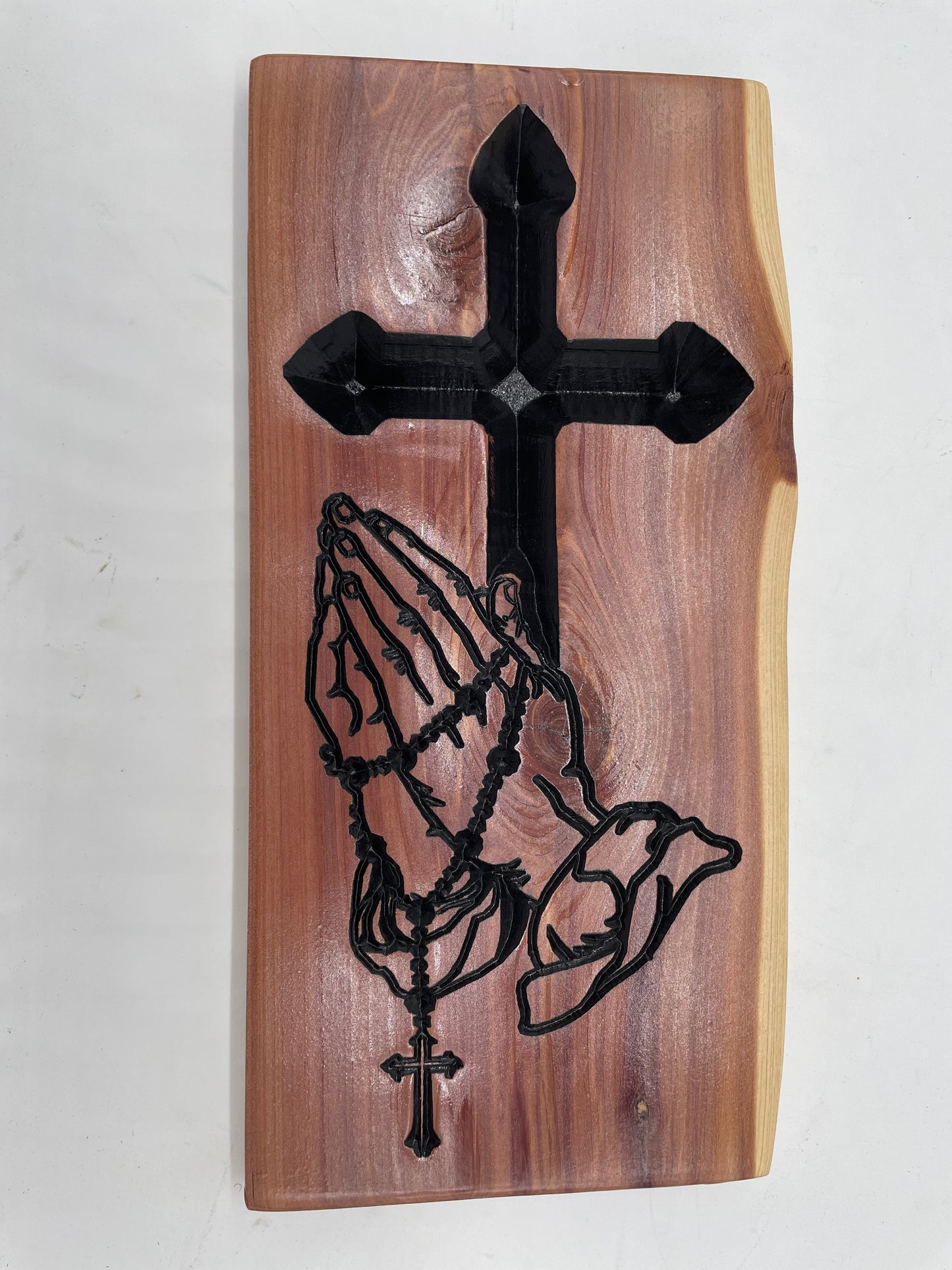 Handcrafted cedar cross with praying hands and rosary. Rustic Christian wall art—perfect for home décor, prayer room, or meaningful gift.